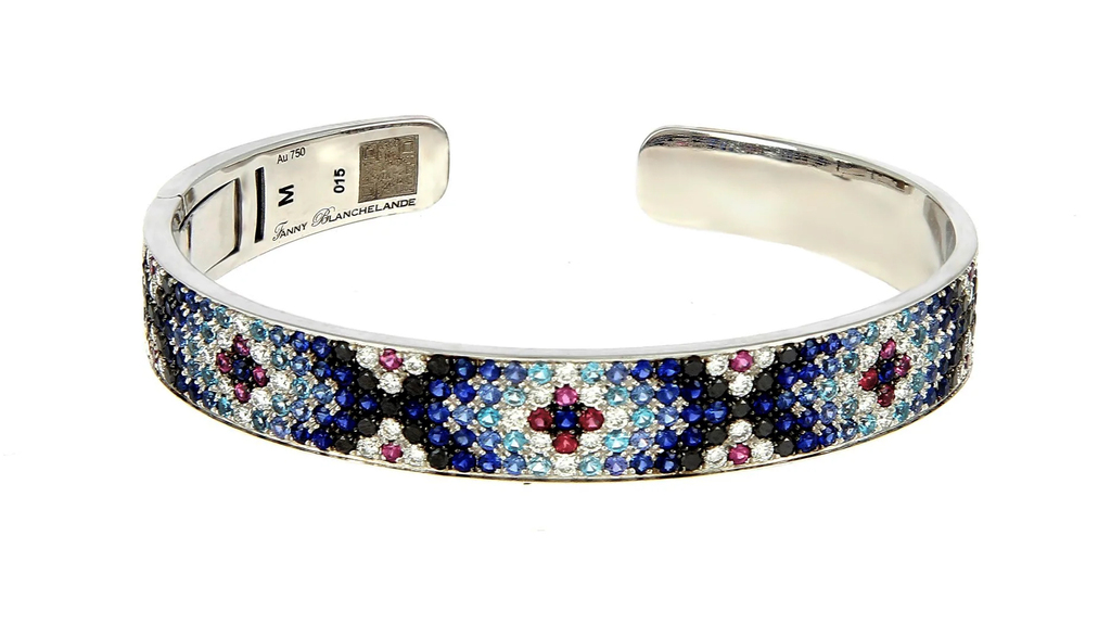 Fanny Blanchelande bracelets are luxurious interpretations of classic woven friendship bracelets, a summertime staple. In darker hues, the Mullers say they match fall’s mood. This bracelet is crafted in 18-karat white gold with diamonds, sapphires, rhodolite, and aquamarine ($13,430). Fanny Blanchelande bracelets are luxurious interpretations of classic woven friendship bracelets, a summertime staple. In darker hues, the Mullers say they match fall’s mood. This bracelet is crafted in 18-karat white gold with diamonds, sapphires, rhodolite, and aquamarine ($13,430).