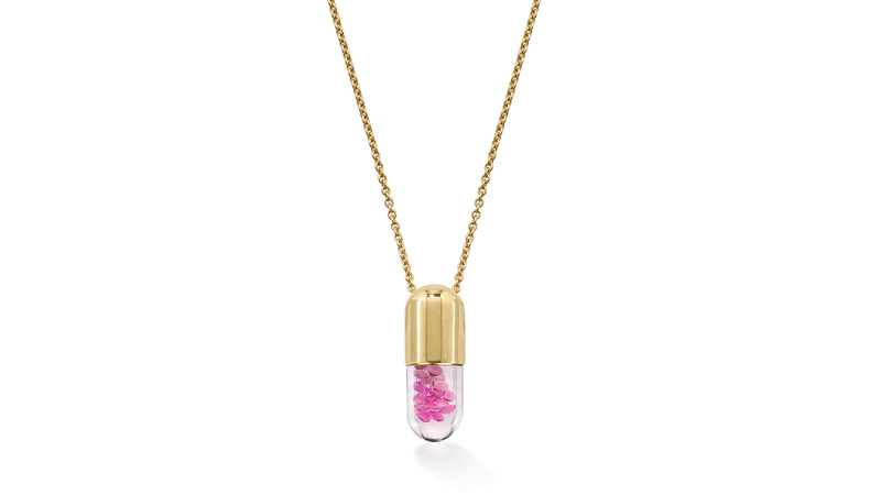<a href="https://www.robinsonpelham.com/" target="_blank">Robinson Pelham</a> mini “Elixir of Love” pendant with floating pink sapphires in a glass vial with a 9-karat yellow gold cap ($1,400)