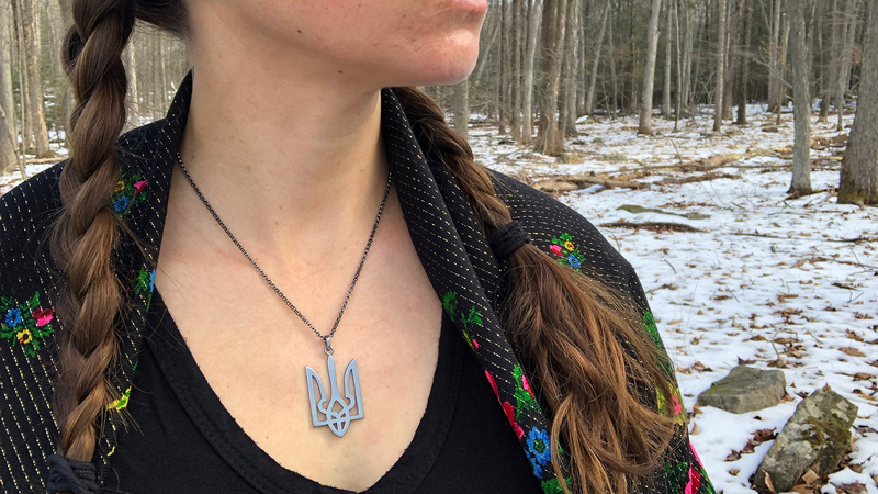 Jewelry designer Alex Lozier wears her Ukrainian Tryzub pendant.