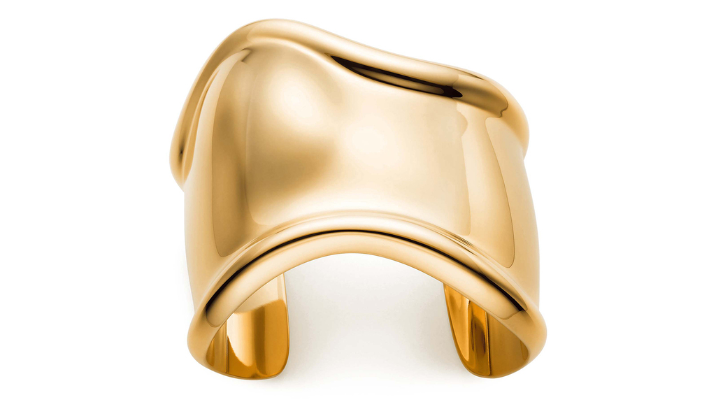 A medium version of Elsa Peretti’s Bone Cuff in 18-karat yellow gold ($16,000). This particular cuff was designed to be worn on the left wrist. (Photo courtesy of Tiffany & Co.) A medium version of Elsa Peretti’s Bone Cuff in 18-karat yellow gold ($16,000). This particular cuff was designed to be worn on the left wrist. (Photo courtesy of Tiffany & Co.)