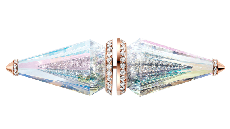 This brooch up close reveals the jewel’s many layers: holographic-coated rock crystal atop a layer of diamonds, all set in pink gold.