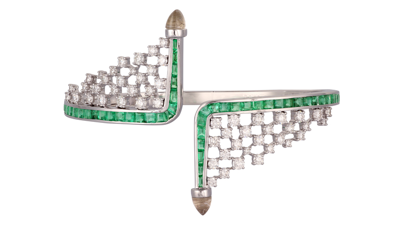 Bangle in 18-karat white gold with 2.58 carats of white diamonds, 1.11 carats of crystal quartz and 3.45 carats of emeralds ($10,790)