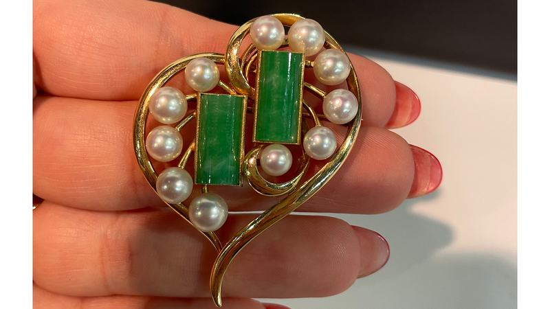 A vintage Mikimoto pearl and jade brooch in gold