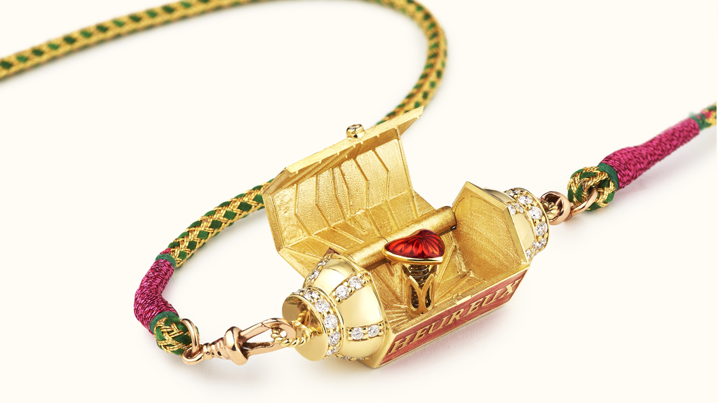 Inside this Marie Lichtenberg locket is a sweet enamel heart. Inside this Marie Lichtenberg locket is a sweet enamel heart.