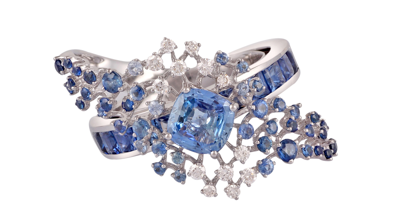 An 18-karat white gold ring with 0.16 carats of white diamonds and 3.22 carats of blue sapphire ($3,380).