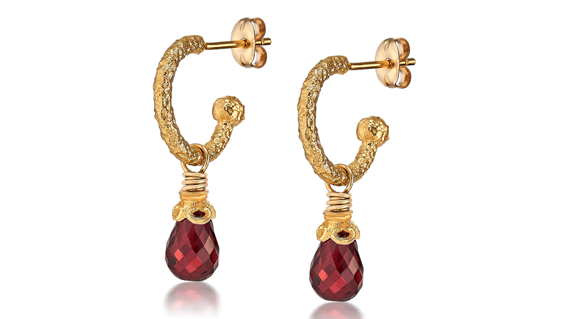 <a href="https://anatolijewelry.com/" target="_blank">Anatoli</a> Fiori petite hammered 18-karat gold vermeil garnet hoops ($135)