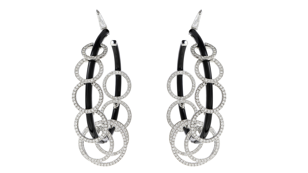 Nikos Koulis 18-karat white gold hoop earrings with white diamonds and black enamel (price available upon request)