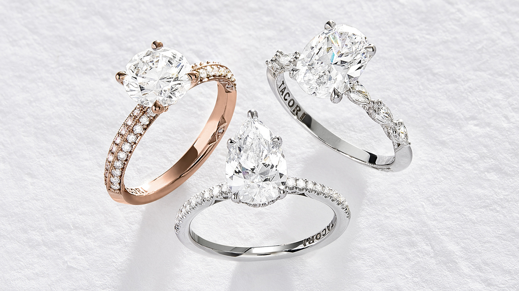 Counterclockwise from left: a knife-edge diamond engagement ring, a diamond solitaire with diamond pave on the shank, and an engagement ring with pear-shaped diamond side stones Counterclockwise from left: a knife-edge diamond engagement ring, a diamond solitaire with diamond pave on the shank, and an engagement ring with pear-shaped diamond side stones
