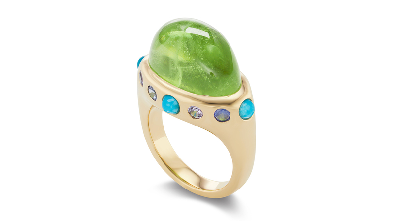 <a href="https://brentneale.com/" target="_blank"> Brent Neale</a> cabochon peridot “Crown Ring” in 18-karat yellow gold with turquoise and blue and purple sapphires ($7,200)
