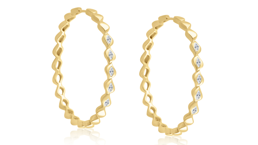 Almasika “Grande Marquise Hoops” in 18-karat yellow gold and diamond ($6,250)