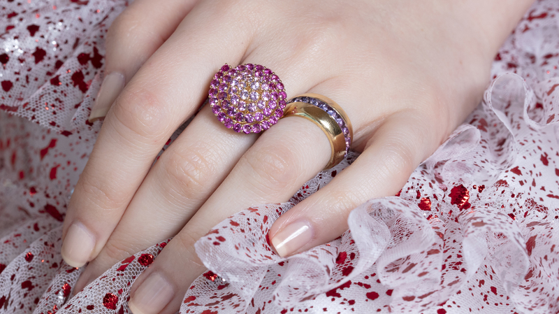 The “Spiral Ring” (left) in 18-karat gold features 3.6 carats of sapphires.