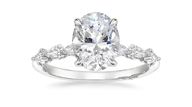 Engagement ring with pear-shaped diamond side stones