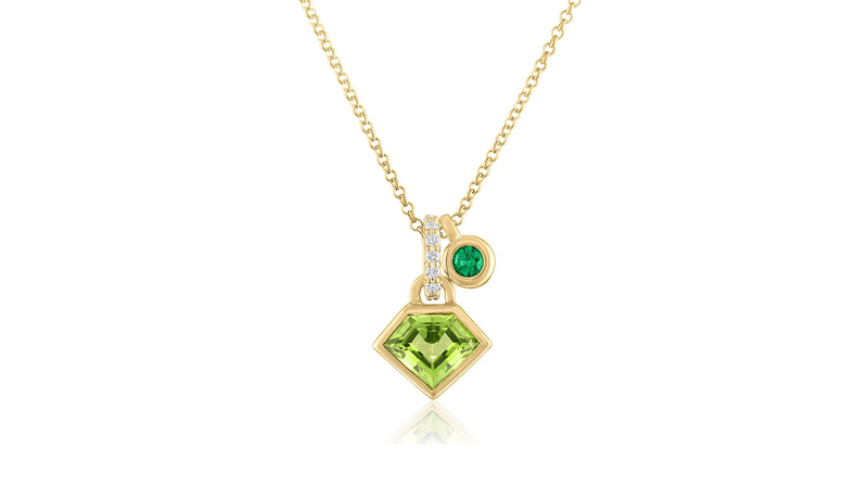 <a href="https://julielambny.com/collections/metropolis/products/copy-of-14k-white-gold-super-charming-necklace-with-rock-crystal-diamond" target="_blank"> Julie Lamb NY</a> “Metropolis Super Charming Pendant” with a shield-cut peridot and diamond and emerald accents set in 18-karat gold ($2,700)