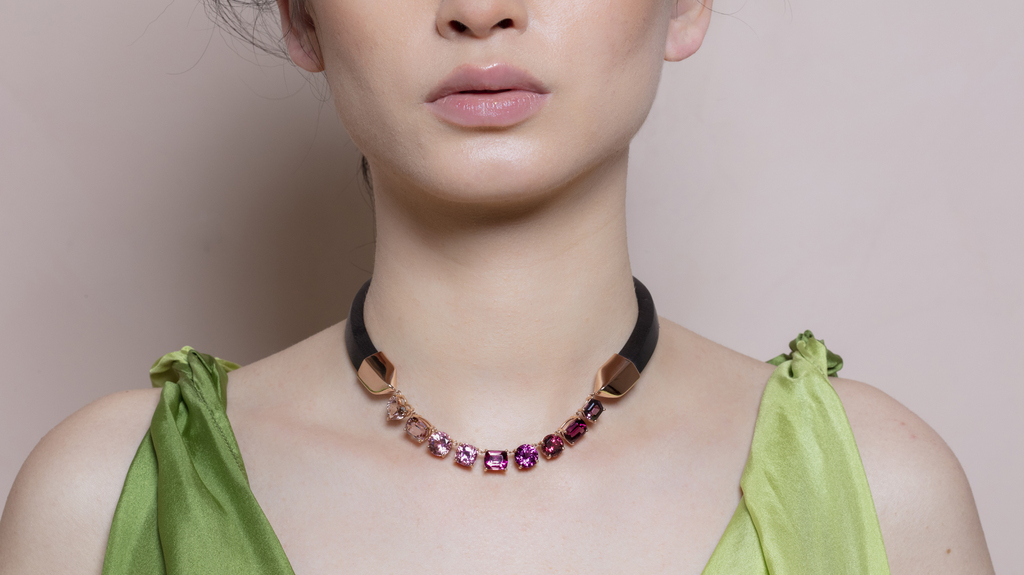 The “Dress Up Necklace” features ebony wood, 18-karat gold, 15.26 carats of tourmaline, 7.52 carats of garnet, 3.01 carats of morganite, and 2.24 carats of spinel. The “Dress Up Necklace” features ebony wood, 18-karat gold, 15.26 carats of tourmaline, 7.52 carats of garnet, 3.01 carats of morganite, and 2.24 carats of spinel.