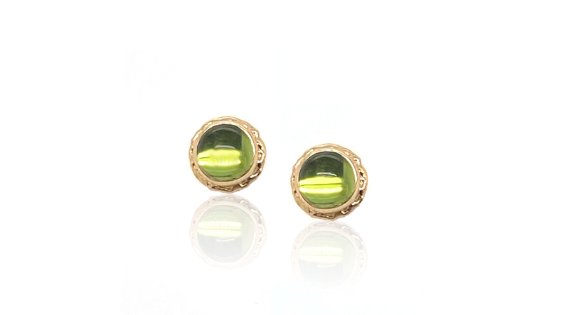<a href="https://www.greenwichjewelers.com/products/peridot-stud-earrings?_pos=1&_sid=b46a15216&_ss=r" target="_blank"> Jamie Joseph</a> 14-karat gold peridot stud earrings