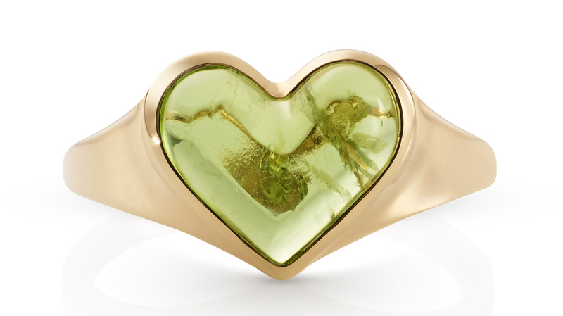 <a href="https://www.alinaabegg.com/" target="_blank">Alina Abegg</a> peridot “Love Sticker” ring set in 14-karat rose gold ($800)