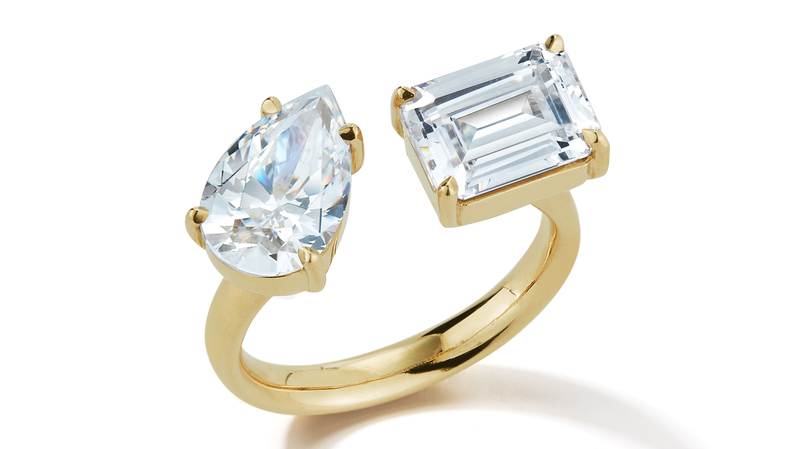 This two-stone ring features a pear-shaped diamond and emerald-cut diamond combination.