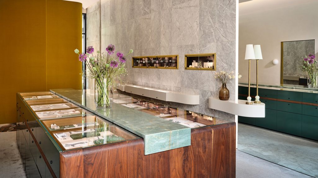 The custom display cabinet features a continuous line of quartzite. The custom display cabinet features a continuous line of quartzite.