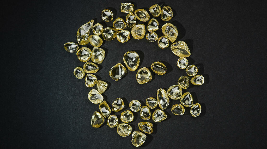 Rough yellow diamonds from Ellendale in Western Australia. Burgundy Diamonds Ltd., one of the companies looking to reactivate the site, said it expects to start commercial production later this year. (Photo courtesy of Burgundy Diamond Mines Ltd.)