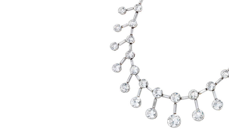 This Art Deco Cartier diamond necklace features collet-set old European cut diamond connected by diamond baguettes. It sold for $673,400.