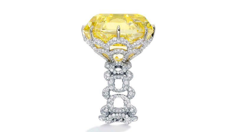 An anonymous bidder paid $3.4 million for “The Sienna Star,” a cut-cornered, square step-cut 73-carat fancy vivid yellow diamond by Glenn Spiro.