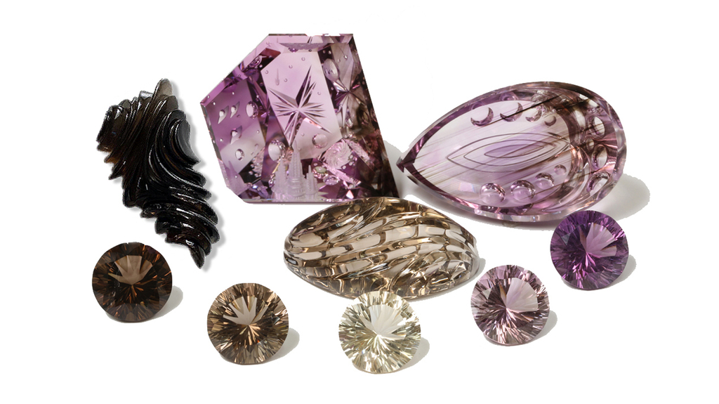 These cut and carved amethyst and smoky quartz stones came from Hallelujah Junction, Nevada. These cut and carved amethyst and smoky quartz stones came from Hallelujah Junction, Nevada.