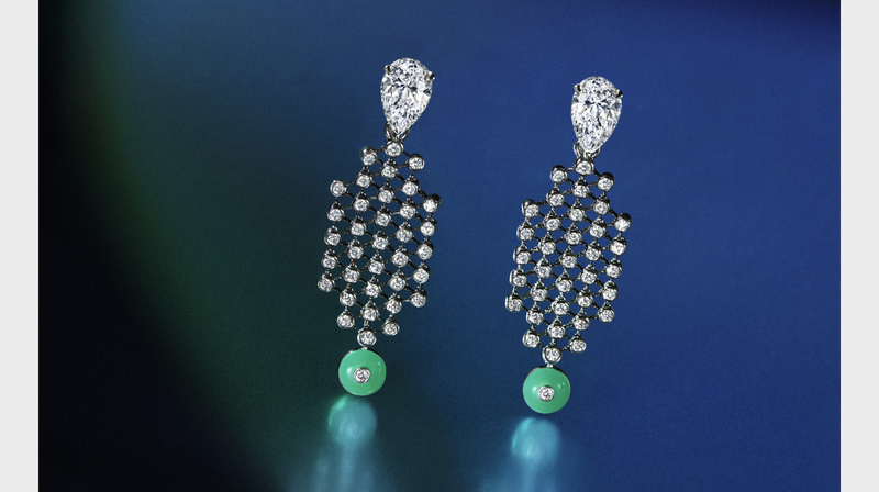 Pear-shaped diamonds weighing more than 3 carats each can be detached from these chandelier earrings.